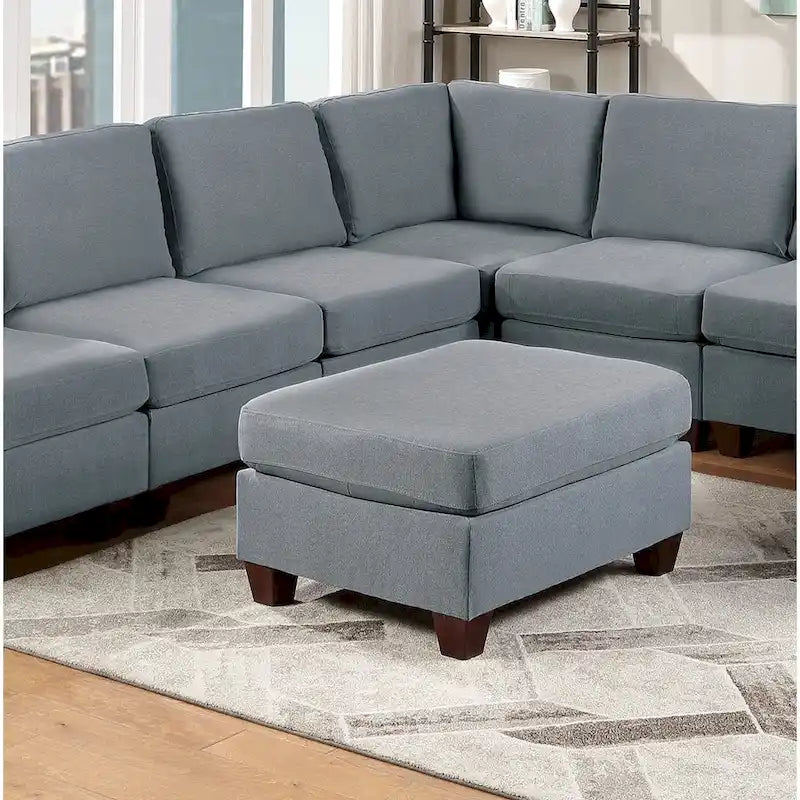 Pouf de cocktail tapissé de tissu effet lin