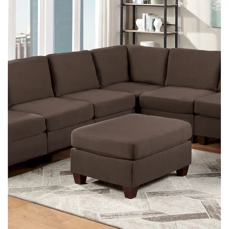 Pouf de cocktail tapissé de tissu effet lin
